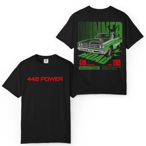 May include: Black t-shirts with a car graphic. One shirt features the text "440 POWER" in red. The other shirt displays a green car with the text "RUNNER ROAD" and "440 POWER" in green and red, with "EST. 1969".