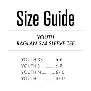 May include: Size guide for youth raglan 3/4 sleeve tee shirts. Sizes XS through L with corresponding age ranges: XS (4-6), S (6-8), M (8-10), L (10-12).