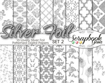 May include: A collection of 16 silver foil patterned digital papers. The designs include floral, geometric, and paisley patterns in shades of silver and white. The words "Silver Foil" and "Scrapbook Gems" are displayed on the image.