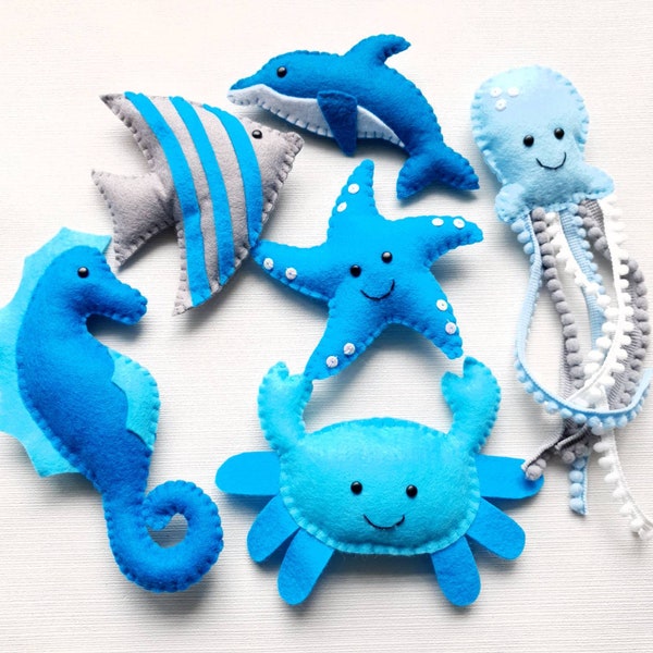 Under the sea garland in blues or blue green. Fish, seahorse, dolphin, starfish, crab and jellyfish decor, bunting, hanging decorations