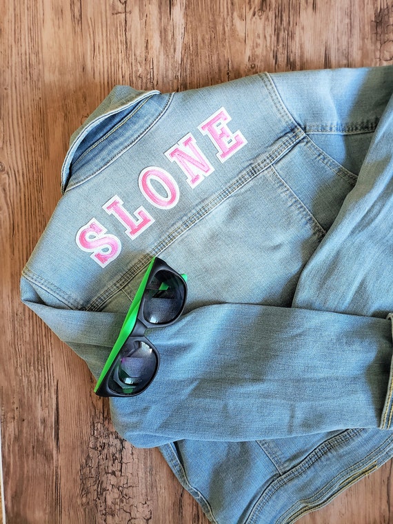 pink patch denim jacket