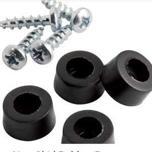 May include: Four black rubber furniture pads with a center hole and four silver screws with Phillips heads.