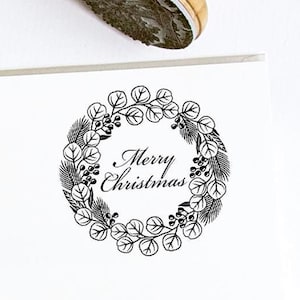 Guirlande de Noël joyeux Noël, branche de pin d'épicéa, baies de houx, eucalyptus, décorations de cadeaux de Noël, tampon en bois