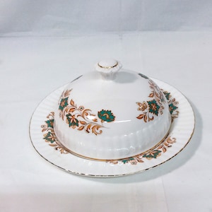 Ashley bone china covered butter or cheese dish. Turquoise and bronze floral and leaf design. Dining and serving china.