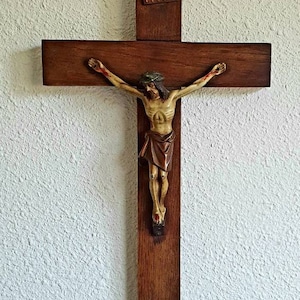 Crucifix, Jesus on the cross, crucifixion of Christ. Catholic wooden crucifix. INRI. Jesus of Nazareth