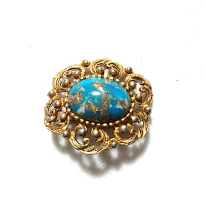 Vintage pin, brooche, gold coloured surround with a turquoise stone, very pretty mid centuary Vintage jewelry.