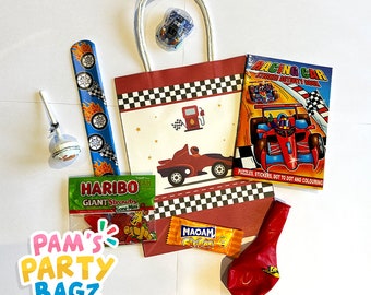 May include: A red and white checkered party favor bag filled with a red balloon, a red and black racing car activity book, a red and white lollipop, a red and white candy bracelet, a red and white candy bar, a red and white candy pack, and a red and white candy bar. The bag has a red and white checkered pattern and a picture of a red racing car on it. The text on the book says "Racing Car Activity Book". The text on the candy bar says "Haribo Giant Strawbs Gone Mini". The text on the candy pack says "Maoam Stripes".