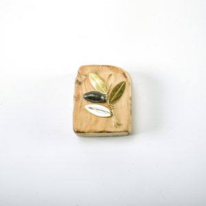 Handmade bronze gift paperweight in wood