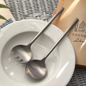 Rosenthal Rostfra Österrike, serveringsset i rostfritt stål, 50x50 cm, 1900-tal, komposition, 180x130 cm