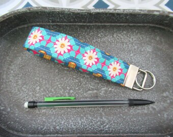 Daisy-polsbandje, madeliefje-sleutelhanger, madeliefje sleutelhanger-polsbandje, madeliefje polskoordje, turkoois schoudertasje, madeliefje cadeau, helder schoudertasje, leuke sleutelhangers