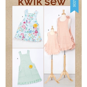 May include: Sewing pattern for children's and misses' aprons. The pattern includes two styles: a floral print apron and a solid color apron. The pattern is from Kwik Sew and the pattern number is K4336.