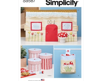 May include: A Simplicity sewing pattern showing a house-shaped organiser with red details, a mushroom pincushion, and matching storage boxes. The pattern also includes a hanging storage bag with mushroom embroidery. The text "S9587" and "Simplicity" are visible.
