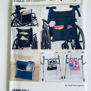 May include: Simplicity sewing pattern number 2822 for a wheelchair or walker bag. The pattern includes four different styles of bags, each with multiple pockets. The bags are shown in various colors and fabrics. The pattern is designed by Faith Van Zanten.