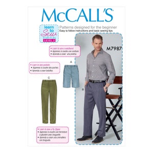 May include: McCall's sewing pattern for beginner level 2. The pattern includes instructions for pants and shorts, with options to learn how to sew a waistband, pockets, and a fly zipper. The image shows a man wearing the finished garments.
