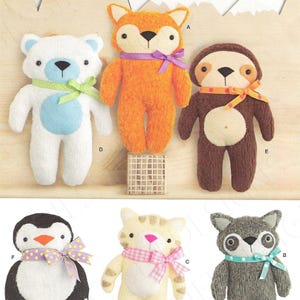 May include: A sewing pattern for making six plush toys: a fox, a sloth, a polar bear, a penguin, a cat, and a raccoon. The pattern is from Simplicity, a well-known sewing pattern company. The pattern number is 8440.