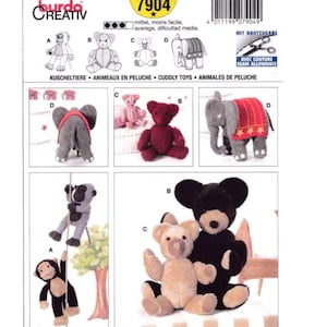 May include: A sewing pattern sheet featuring various stuffed animal designs, including teddy bears, an elephant, and a monkey. The sheet includes the text "Burda Creativ" and "7904". The animals are in different colors and styles.