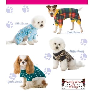 May include: Simplicity pattern 3939 for dog clothing featuring four designs: a plaid jumpsuit, a blue floral jumpsuit, a leopard print shirt, and a green shirt with white hearts. The text includes Simplicity, Woofy Wear by Wendy, and labels A, B, C, D.