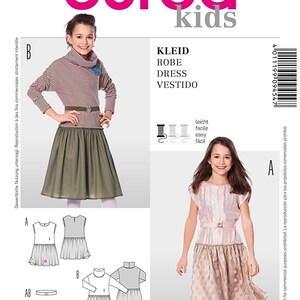 May include: Burda Kids sewing pattern number 9454 for a dress. The pattern includes two different styles, one with a striped top and a solid skirt, and the other with a solid top and a polka dot skirt. The pattern is available in sizes 122-158 (EUR) and 7-13 (US).