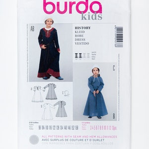 May include: Burda Kids sewing pattern 9473 for a historical dress. The pattern includes instructions for sizes 98-158 cm (38.5-62.2 inches) and 3-13 years. The pattern includes seam and hem allowances. The pattern is for a long-sleeved dress with a gathered skirt and a lace-up front.