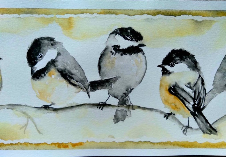 May include: Watercolor painting of three black-capped chickadees perched on a branch. The birds are painted in shades of gray, black, and white, with hints of yellow on their bellies. The background is a soft wash of yellow and white.