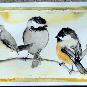 May include: Watercolor painting of six black and white birds with yellow accents perched on a branch. The birds are painted in a realistic style with delicate details.
