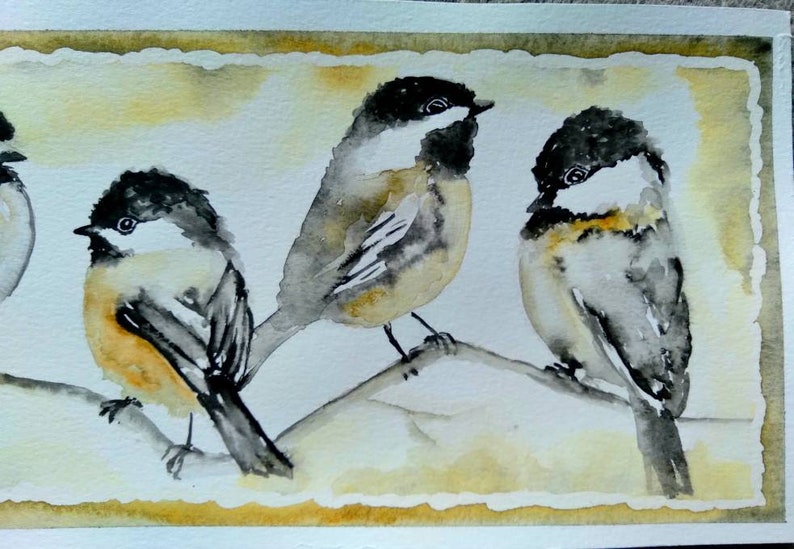 May include: Watercolor painting of three black-capped chickadees perched on a branch. The birds are painted in shades of gray, black, and white, with hints of yellow on their bellies. The background is a soft yellow.