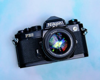 Nikon FE2 Black 35mm SLR Film camera + 50mm F/1.4 Ai Lens
