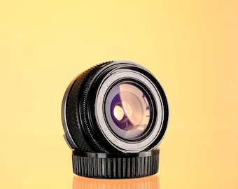 Olympus 24mm f/2.8 Auto-W H.Zuiko Lens