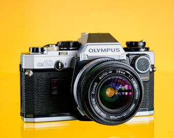 Olympus OM10 35mm SLR FIlm Camera + 50mm F/1.8 Lens Tested Working!