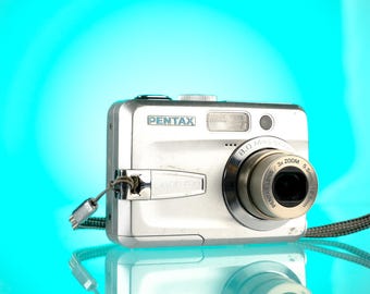 Pentax Optio e10 Digital Point and Shoot Camera Digicam Starter Kit