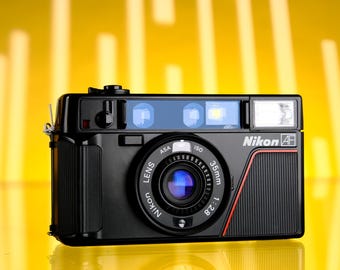 Canon Autoboy F (sure Shot) 35mm Point and Shoot Film Camera Canon Autoboy F (sure Shot) 35mm Point and Shoot Film Camera