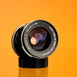 Objectif Canon FD 100 Mm F/2,8 Pour Reflex Argentique AV-1 - Noir/Argent