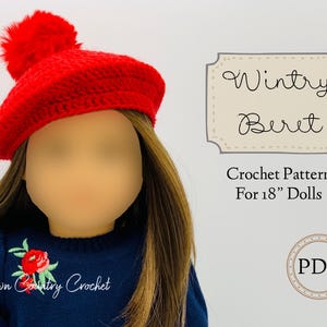 May include: A red crochet beret with a fluffy pom pom, designed for 18 inch dolls. The pattern is available as a PDF download. "Wintry Beret" is written on a beige label with a stitched border. "Crochet Pattern for 18" Dolls" is written below the label. "PDF" is written in a circle with a stitched border.