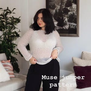 May include: A woman wearing a white knit jumper with a sheer texture and black wide-leg trousers. The text "Muse jumper pattern" is superimposed on the image.
