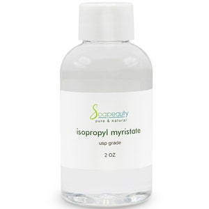 May include: A clear, cylindrical bottle with a white cap, labeled "Soapbeauty pure & natural." The label reads "isopropyl myristate usp grade 2 oz." The bottle is filled with a clear liquid.
