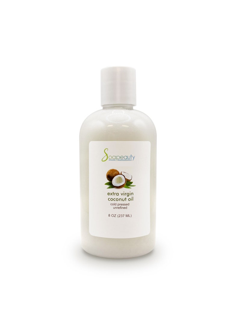 May include: A clear plastic bottle of extra virgin coconut oil, cold pressed and unrefined, with a white label that says "soapeaty" and "extra virgin coconut oil" with a coconut image. The bottle is 8 oz (237 ml).