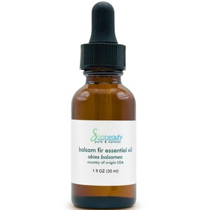 May include: A brown glass bottle with a black dropper top. The bottle is labeled "Soapeauty pure & natural balsam fir essential oil abies balsamea country of origin USA 1 fl OZ (30 ml)"