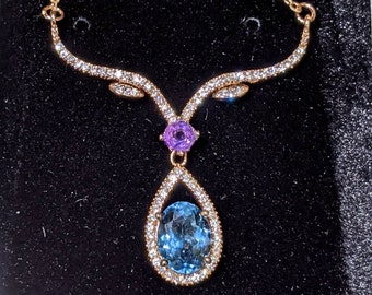 Colgante de topacio azul suizo real con halo Collar de topacio azul de oro rosa 9x7 mm Corte 2ct 0val. Regalo de cumpleaños para mujer Piedra preciosa extraída naturalmente