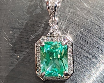 Sea Foam Green Spinel Pendant with Stunning Halo Design - Exquisite Elegance and Natural Beauty.  9x7mm Green Spinel Emerald Cut