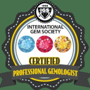May include: International Gem Society (IGS) logo with the text "Certified Professional Gemologist" and three gemstones: a light blue gemstone, a red gemstone, and a yellow gemstone.