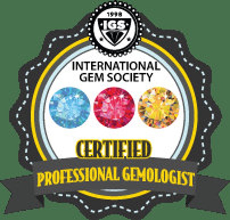 May include: International Gem Society (IGS) logo with the text "Certified Professional Gemologist" and three gemstones: a light blue gemstone, a red gemstone, and a yellow gemstone.