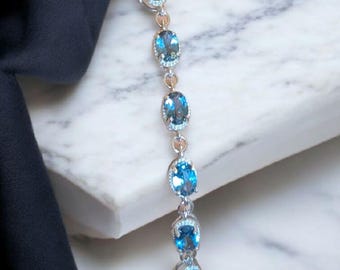 London Blue Topaz Tennis Bracelet: Sterling Silver December Birthstone