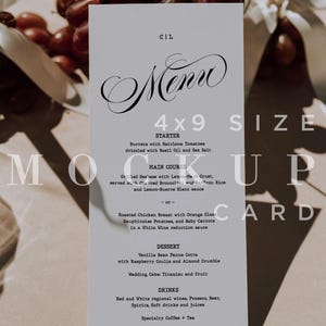 May include: A menu mockup card with a white background, featuring elegant script text that reads "Menu" and "4x9 SIZE." The menu lists starter, main course, dessert, and drink options. A bunch of grapes is in the background.
