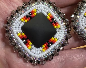White and fire colored with a black matte square cabochon beaded earrings