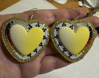 Handmade beaded matte yellow and fire heart earrings