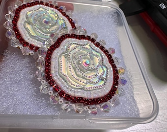 White with red handmade beaded roses earrings. Made in Oregon. Indigenous small business