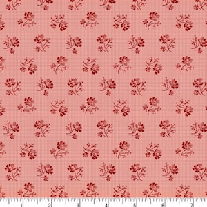 May include: A fabric with a repeating floral pattern. The flowers are a deep red color and are arranged in small clusters. The background is a light pink color with a subtle grid pattern.