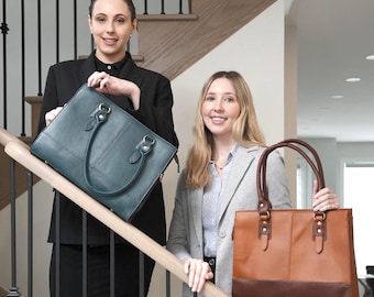 May include: Two rectangular structured handbags. One is a deep teal blue with matching handles and silver-toned hardware. The other is a tan brown with a darker brown base, matching handles, and gold-toned hardware. Both bags feature top handles.