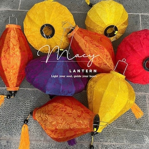 May include: A collection of colorful silk lanterns with tassels. The lanterns are in shades of red, orange, yellow, and purple. The text "Macy Lantern" and "Light your soul, guide your heart" is printed on the image.
