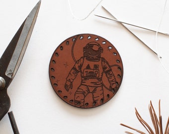 Leather patch COSMOS with an astronaut, ready to sew to customize a cloth or a bag